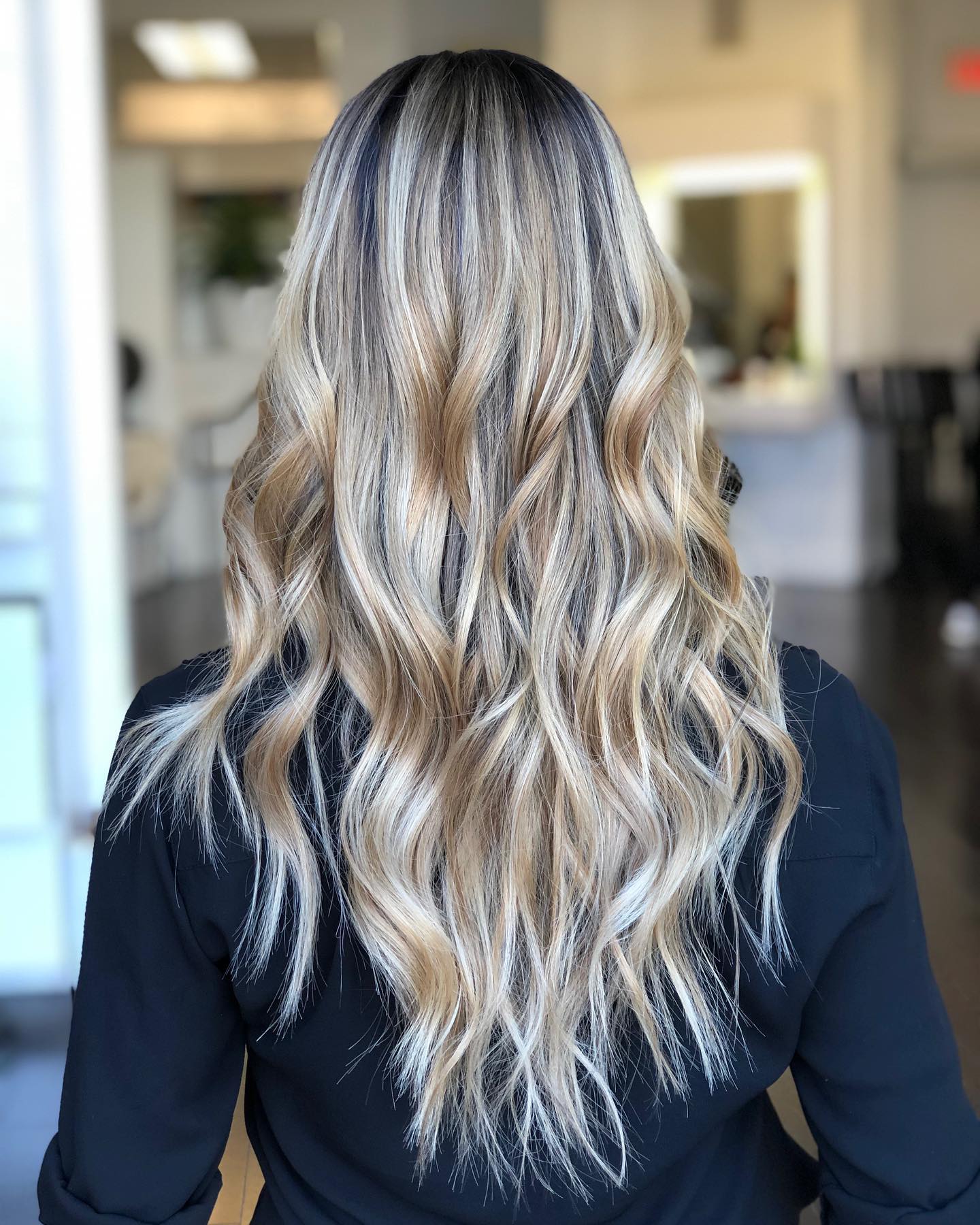 Finished balayage with soft blonde waves